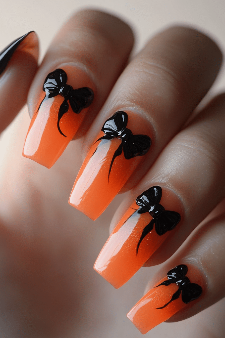 20. Sunset Orange with Black Bow Silhouette (Nail Design Ideas With Bows) - Nail Design Ideas With Bows