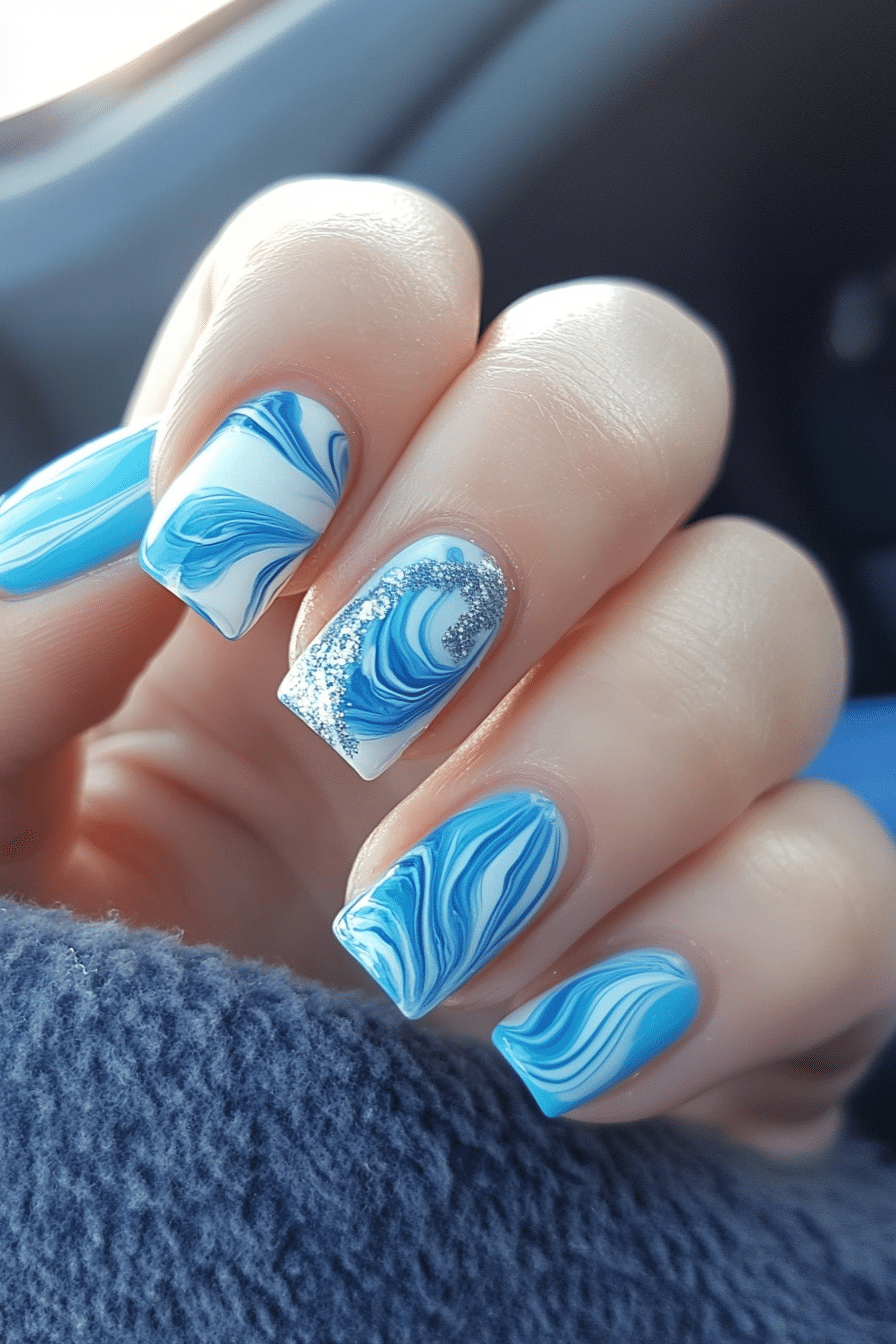 2. Icy Blue Swirls (Blue Nail Design Ideas) - Blue Nail Design Ideas