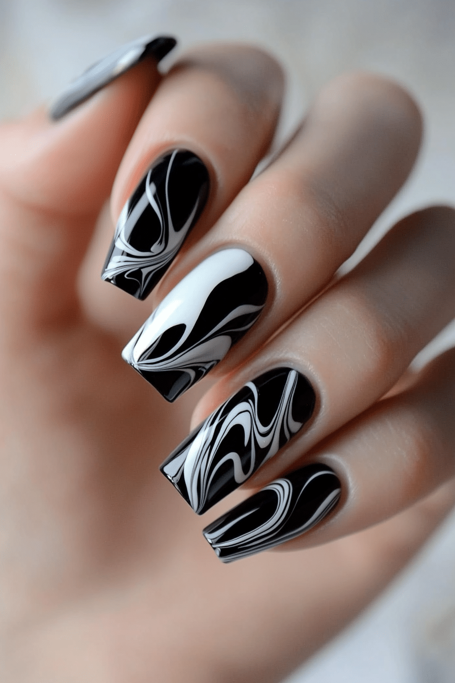 3. Black Marble Swirl (Short Black Coffin Nail Design Ideas) - Short Black Coffin Nail Design Ideas