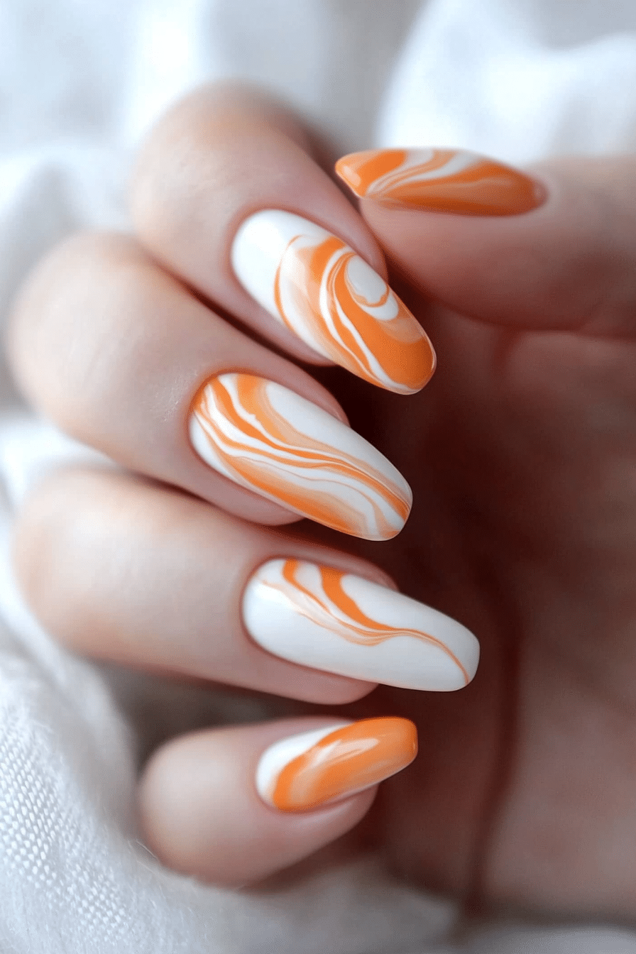 1. Peach Swirl Elegance (Orange Color Nail Design Ideas) - Orange Color Nail Design Ideas