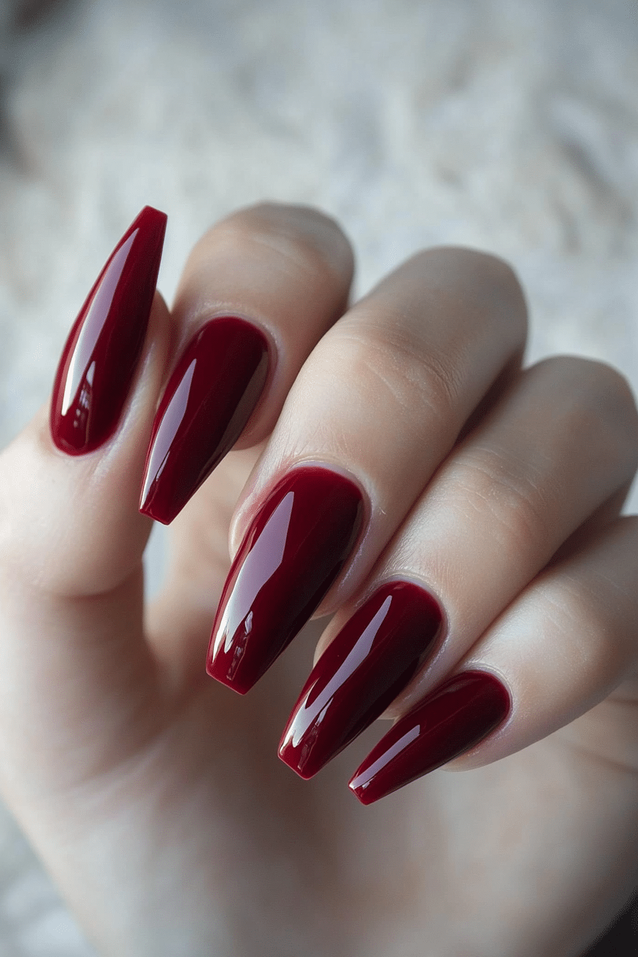 1. Velvet Burgundy Shine (Dark Red Coffin Nail Design Ideas) - Dark Red Coffin Nail Design Ideas
