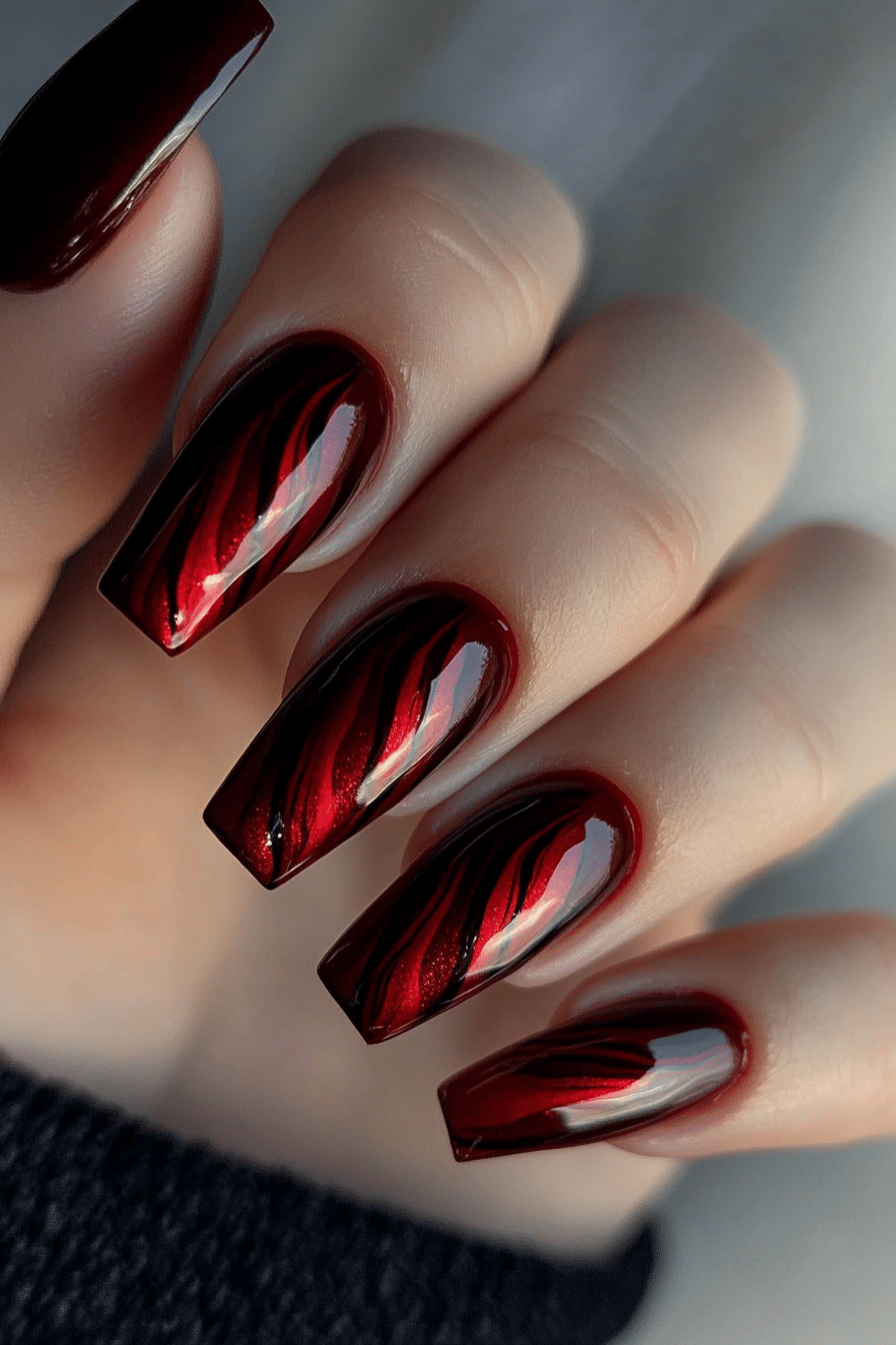 6. Blood Red Cat Eye (Dark Red Coffin Nail Design Ideas) - Dark Red Coffin Nail Design Ideas